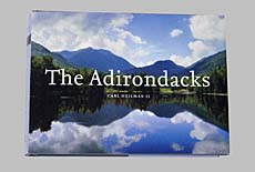 Front cover of the coffee table book, The Adirondacks, by Adirondack Park photographer, Carl Heilman II of Brant Lake New York - published by Rizzoli - nature panoramas and photos of the Adirondack Park